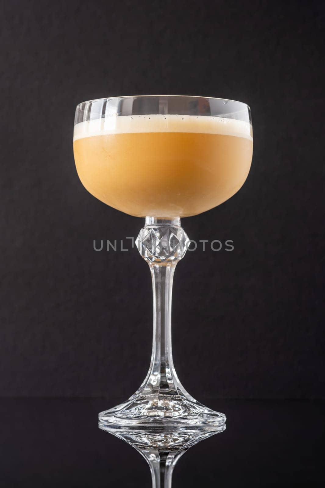 Death Flip cocktail garnished with grated nutmeg