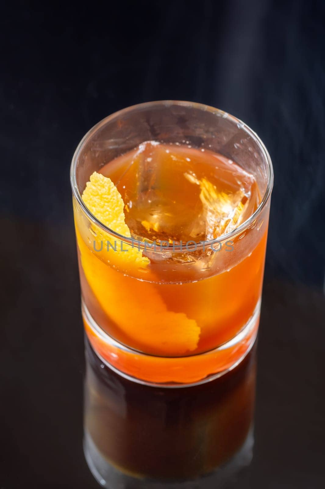 Hunter's tea cocktail garnished with lemon zest