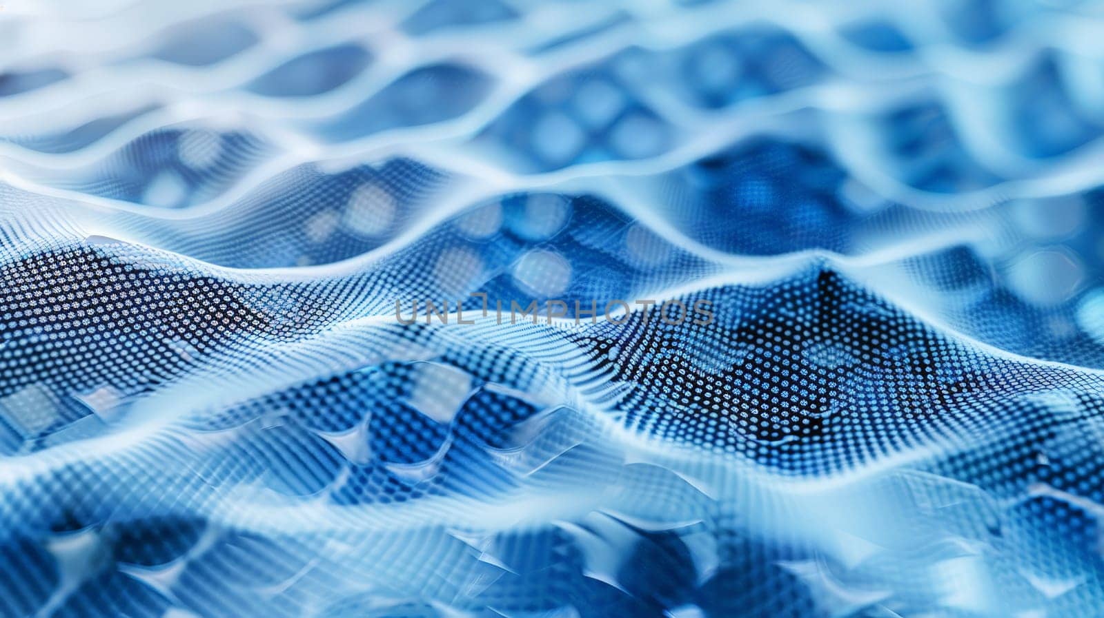 Dive into the ethereal world of graphene with our captivating abstract image, showcasing a delicate mesh pattern in striking shades of white and blue, evoking a sense of depth and complexity.