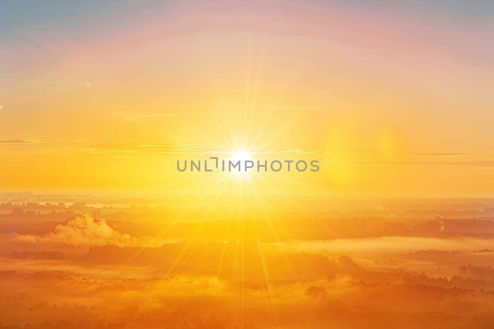 The sun is lowering in the sky, casting a warm light over the clouds. The clouds are billowing and reflecting the orange hues of the setting sun.