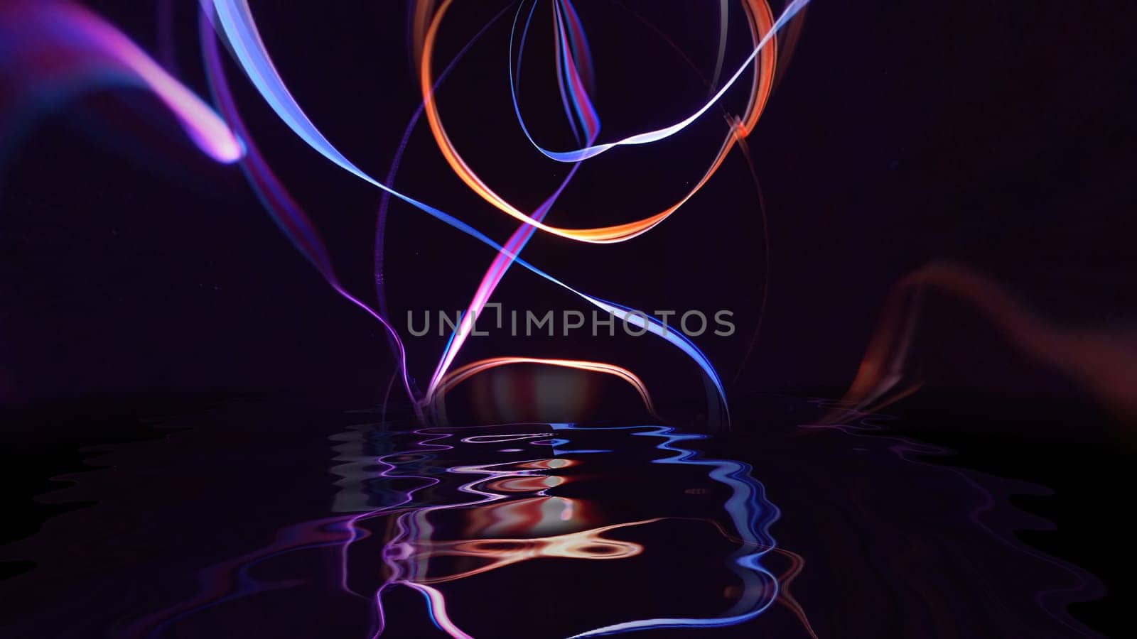 Colorful strings in motion against black background,Colorful strings in motion against black background