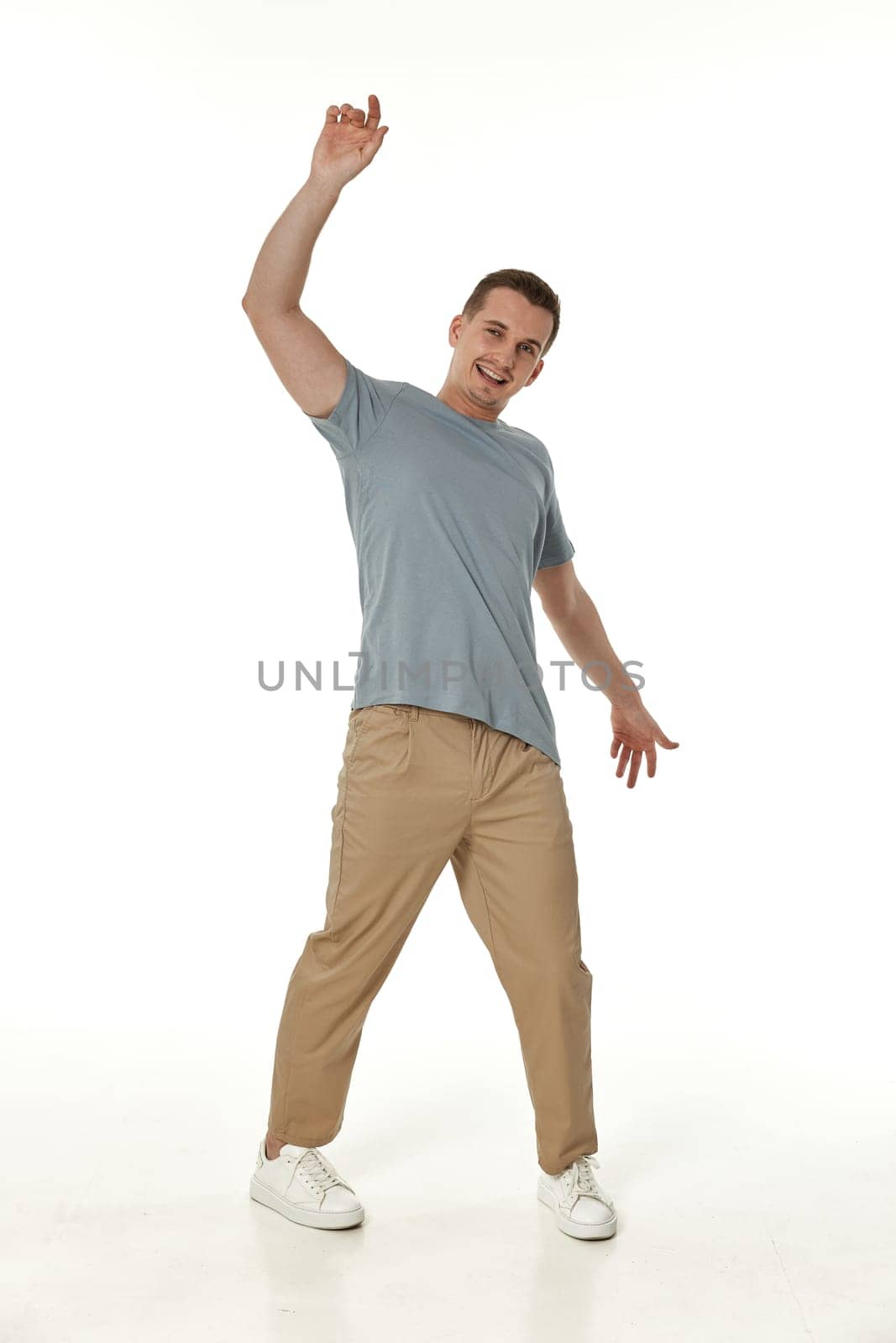 handsome young smiling man on white background