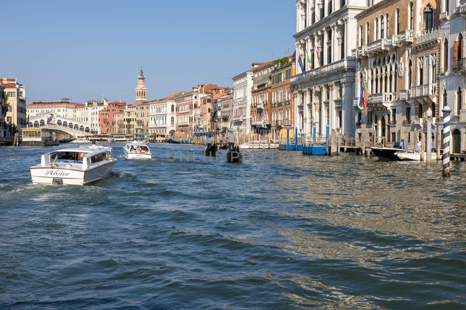 Venice, Italy - September 6, 2022: Houses and palaces seen from a motorboat cruise along the Grand Canal in Venice