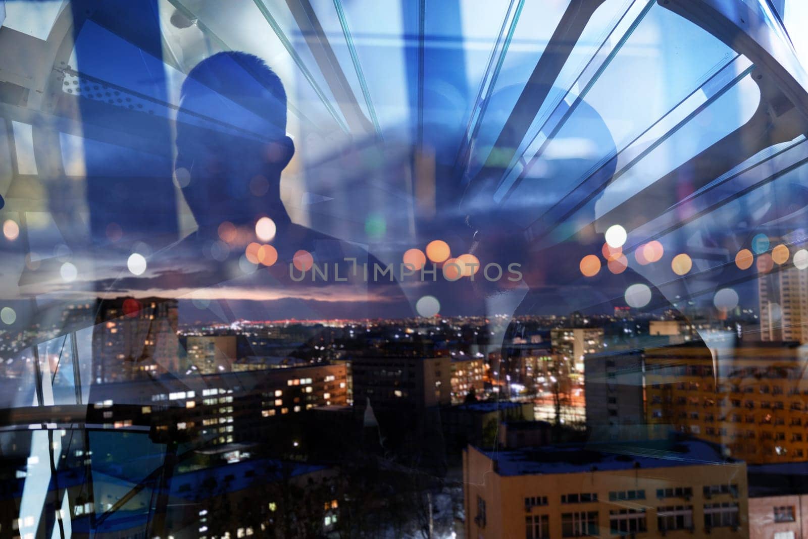Double exposure of business people who work together in office