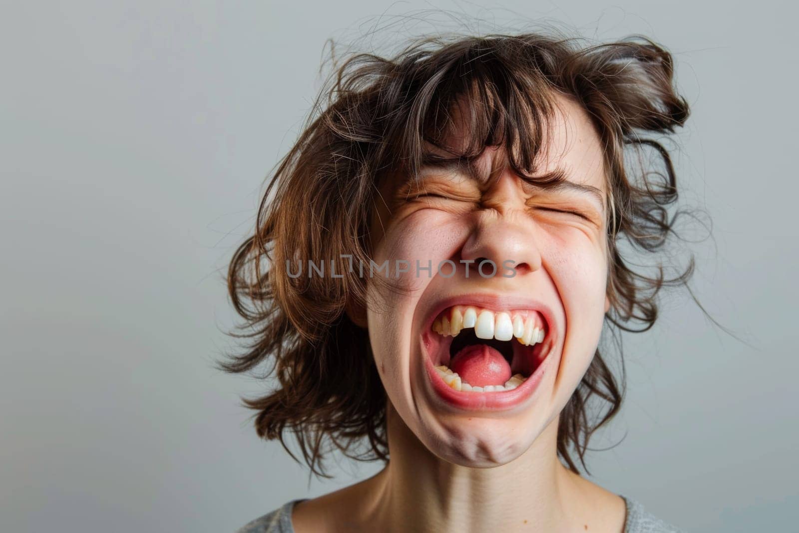 A young girl standing with her mouth open as her long hair blows in the wind, creating a dynamic and lively scene.