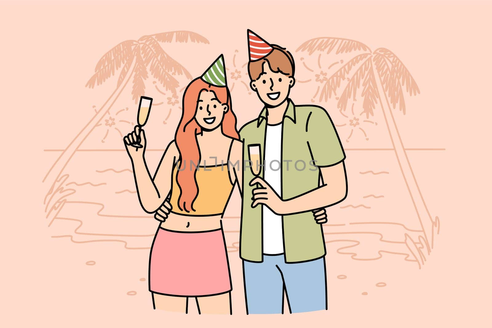 Honeymoon happy couple drinking champagne, standing on beach of sunny resort, wearing birthday caps. Romantic guy and girl celebrate beginning of honeymoon on ocean shore with palm trees