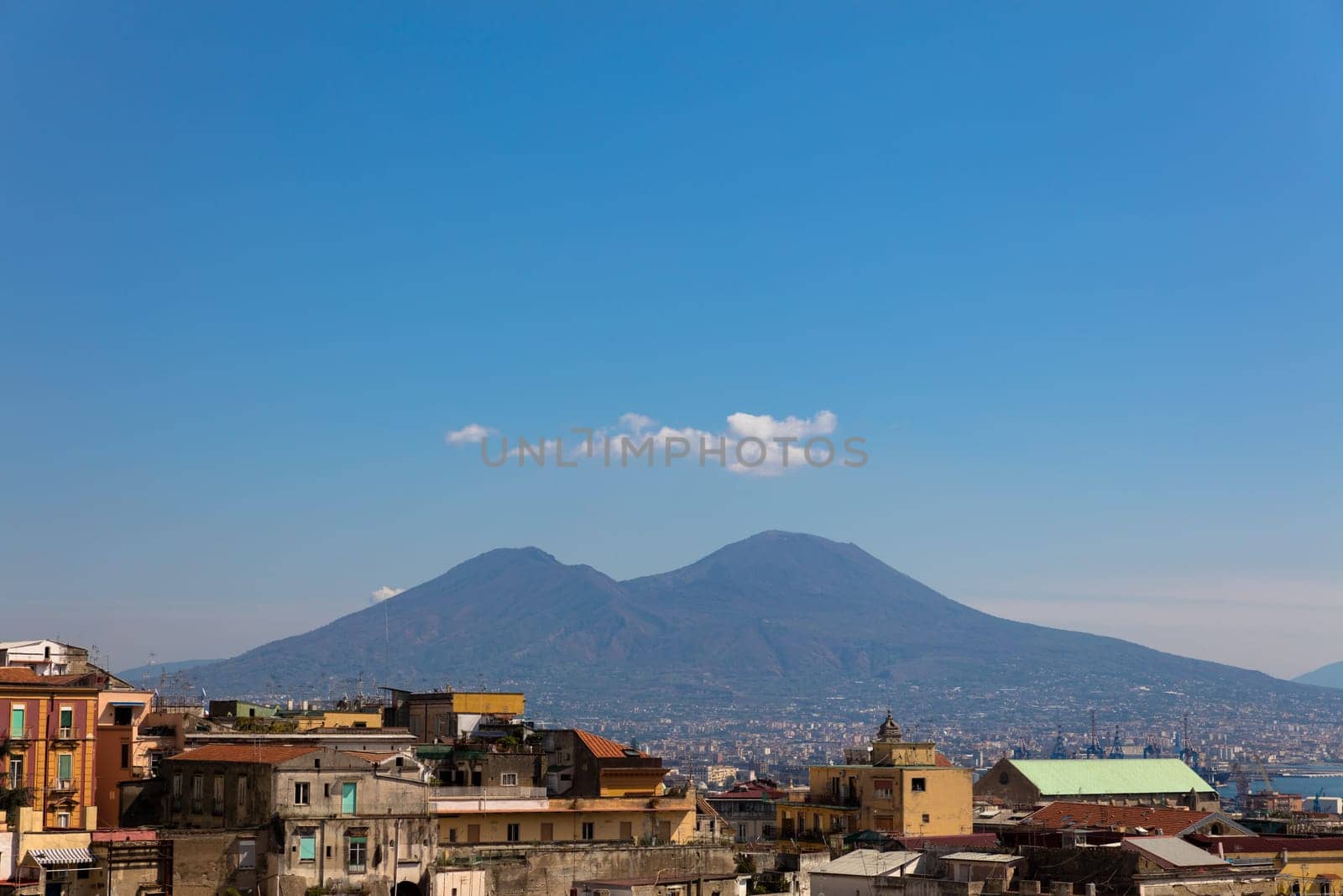 Panorama of napoli with vesuvius,clouds and buildings