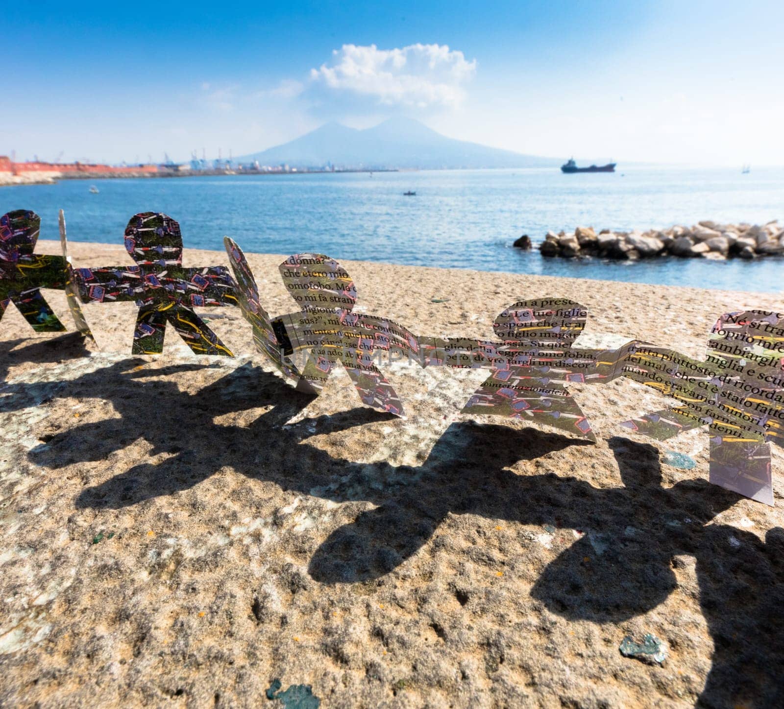 turn around of paper figures with Naples  backround,wallpaper