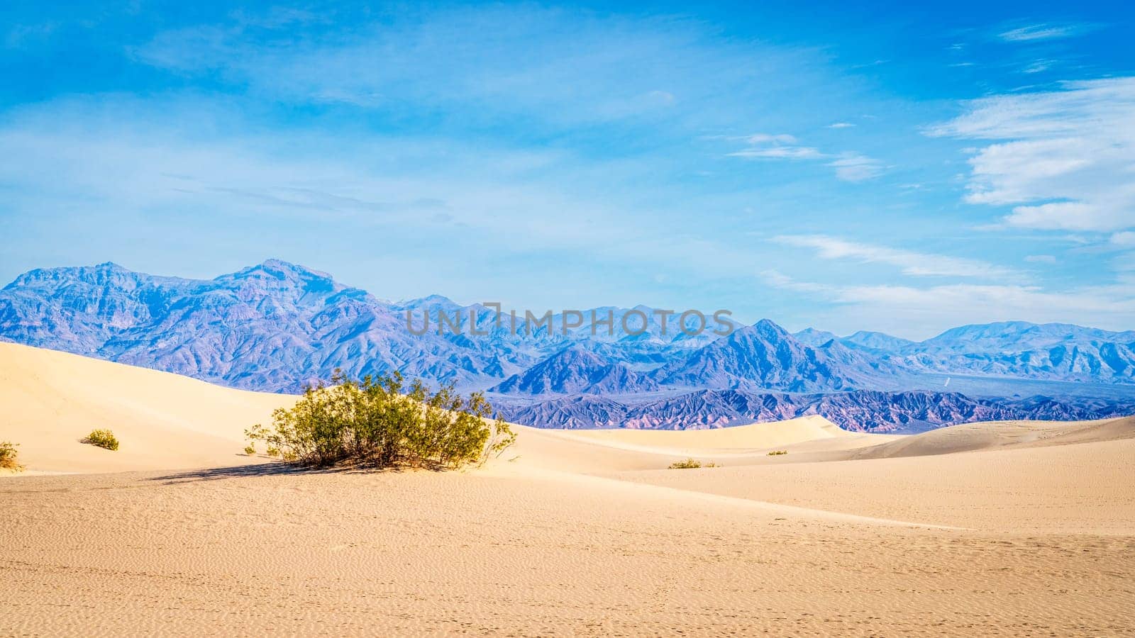 Scenic view of Mesquite Flat Sand Dunes and the mountains behind in Death Valley National Park in California
