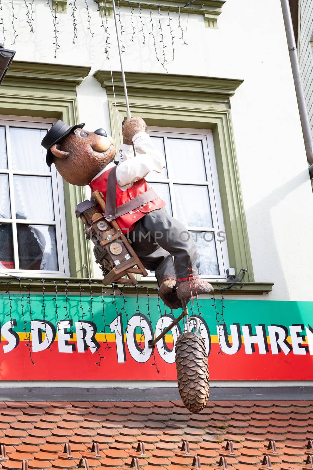 Cuckoo clock with bears at a shop in the Black Forest, Triberg in Germany, traditional craft, vintage wood carving, 30.03.2024