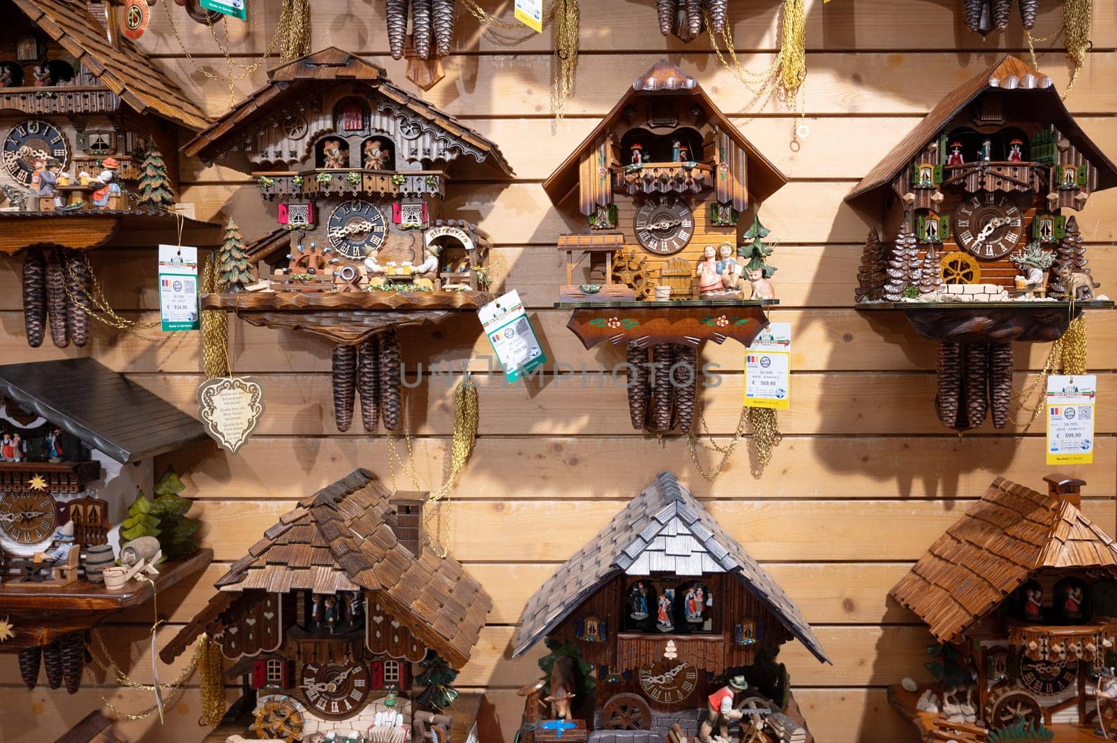 Cuckoo clocks in a shop in the Black Forest, Lake Titisee Neustadt in Germany, traditional craft, vintage wood carving, 30.03.2024