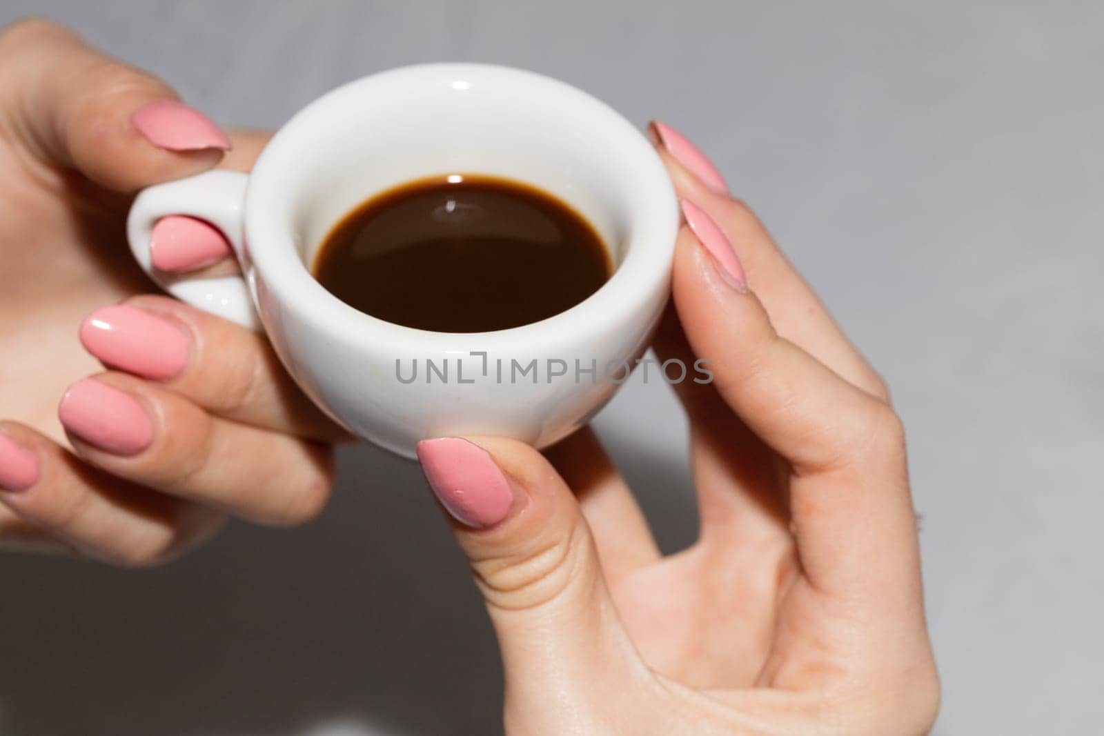 Taking the neapolitan coffee in ceramic cup