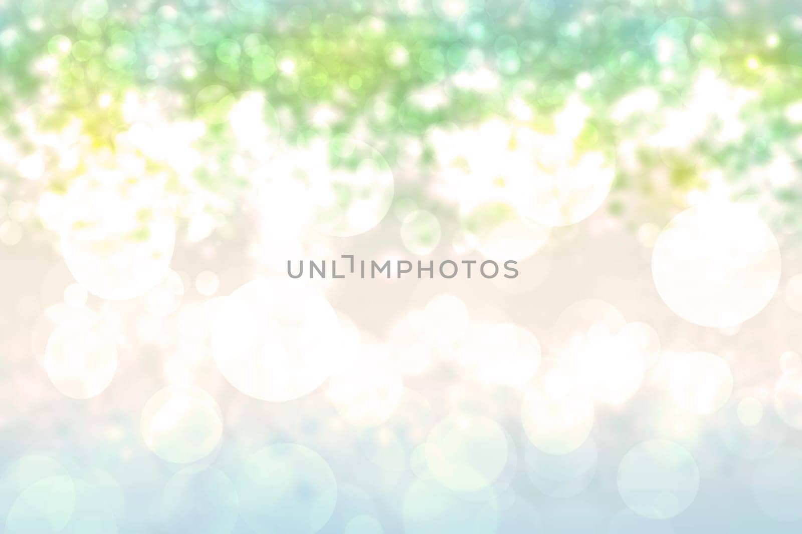 Abstract bright gradient motion spring or summer landscape texture background with natural green blue bokeh lights and yellow bright sunny sky. Beautiful backdrop with space for design.