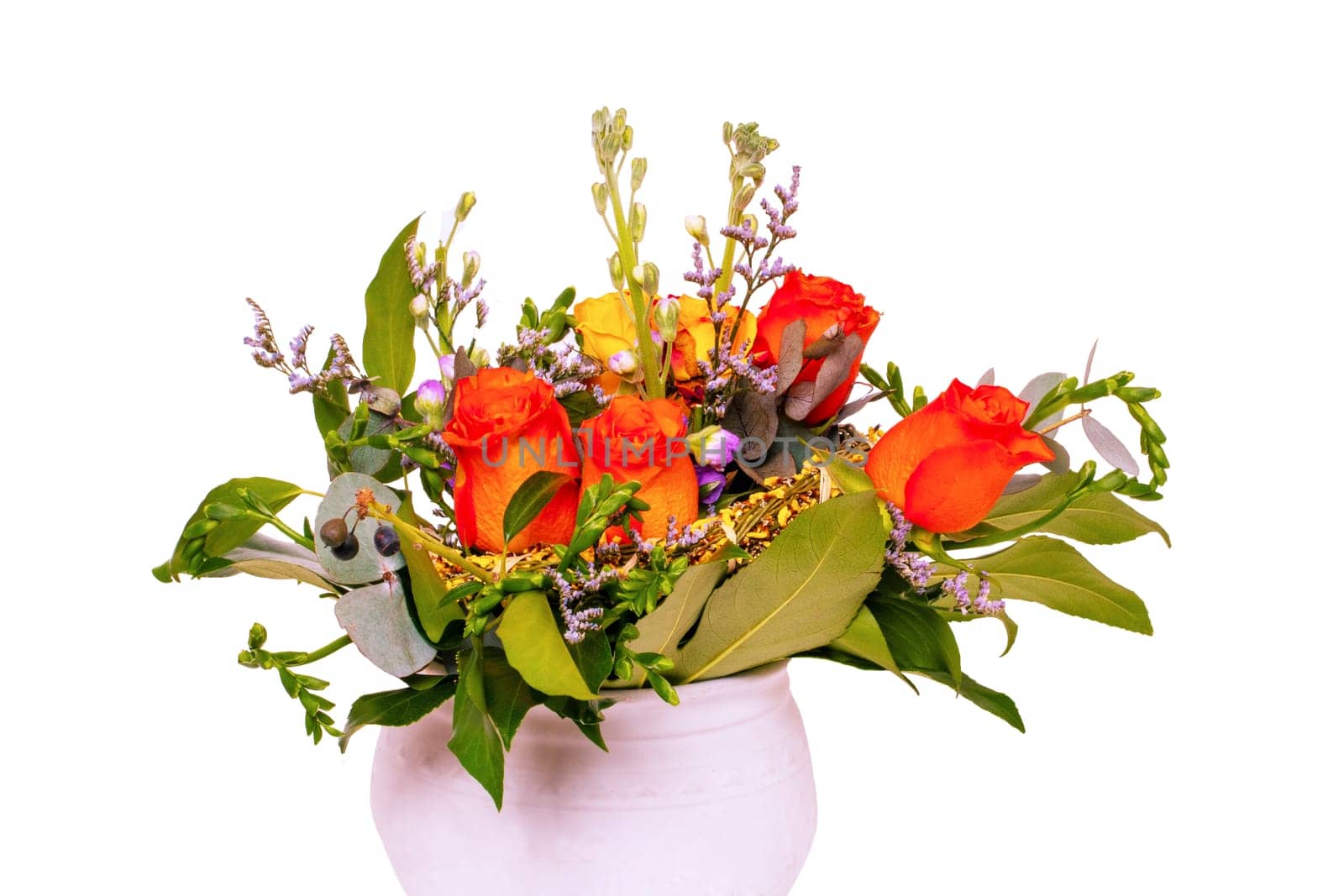 Flower bouquet isolated. Close-up of a beautiful bouquet of bright red yellow roses in a decorative vase. Background texture for Valentine's Day, wedding or other holidays.