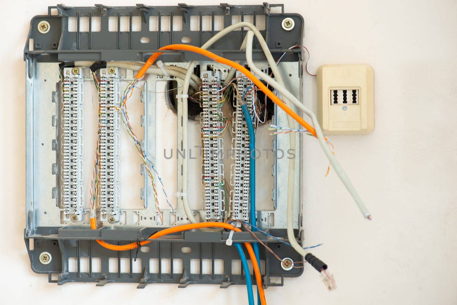 Cable junction box for connection of the computer to the internet and telephone, broken electricity, old network station