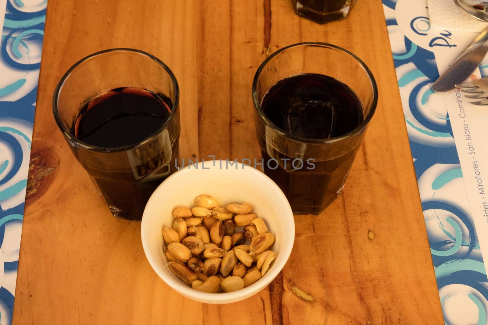 Mais and Chicha Morada on a wooden table, Peru