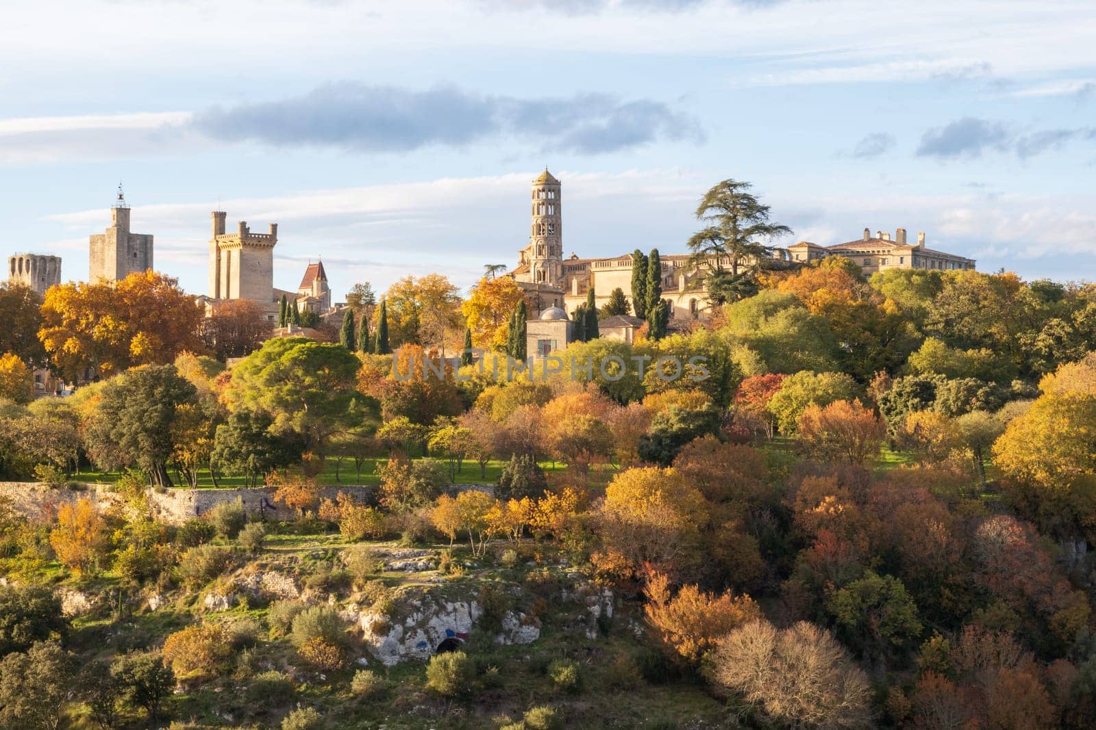 Uzès city of Art and History, general view in autumn. His 11th Century Tour Fenestrelle or Window Tower of the Cathedral of Saint Theodorit. Photography taken in Gard, France