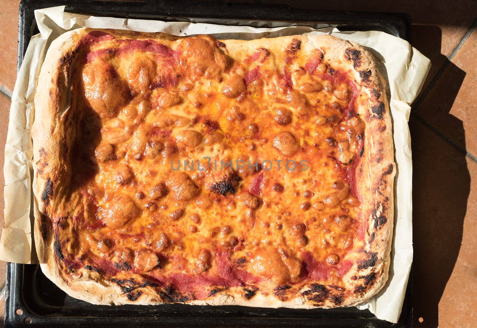 Pizza Margherita Home made well  cooked in owen