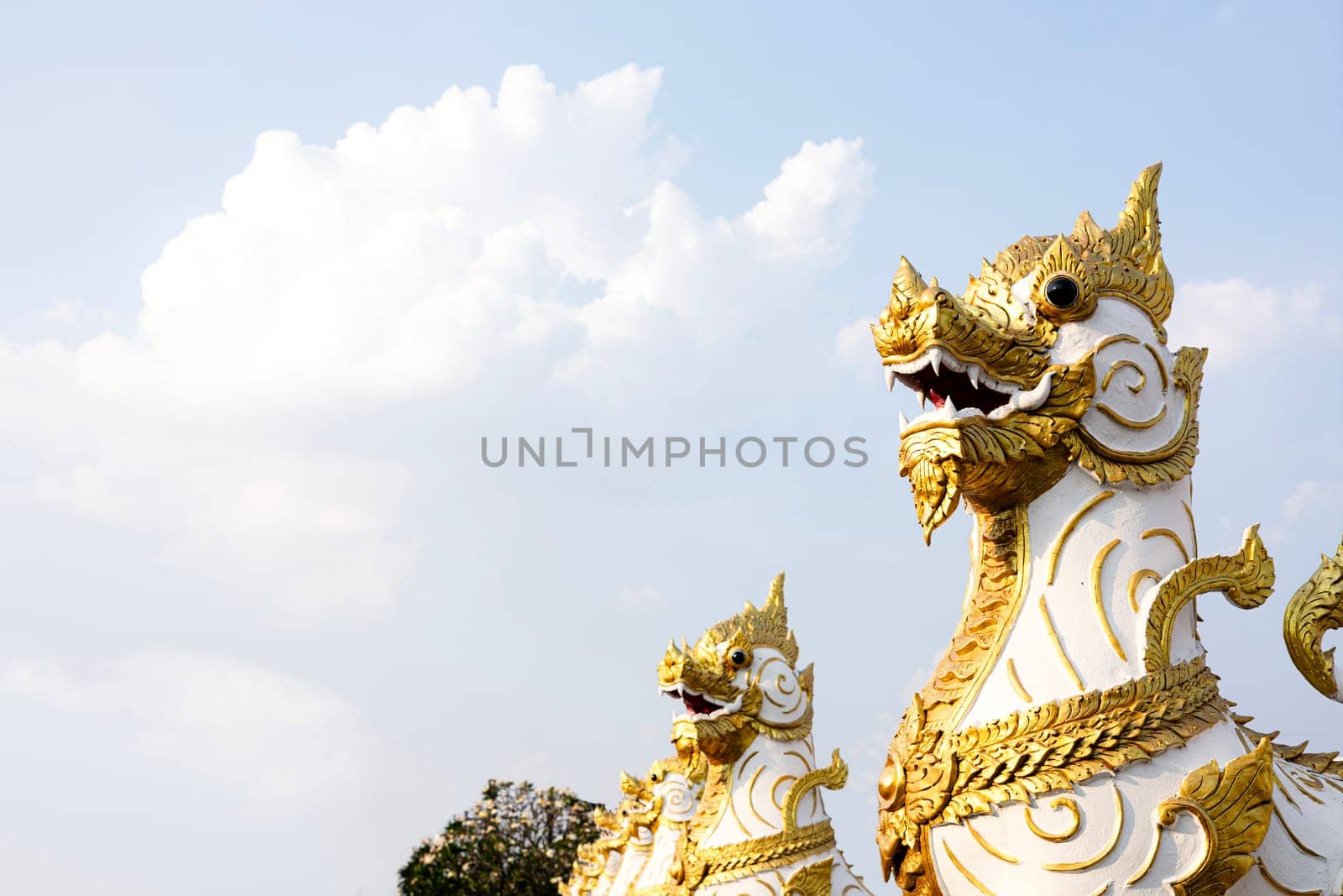 Thai lion statue in front of Phra That Choeng Chum temple at Sakon Nakhon Thailand.