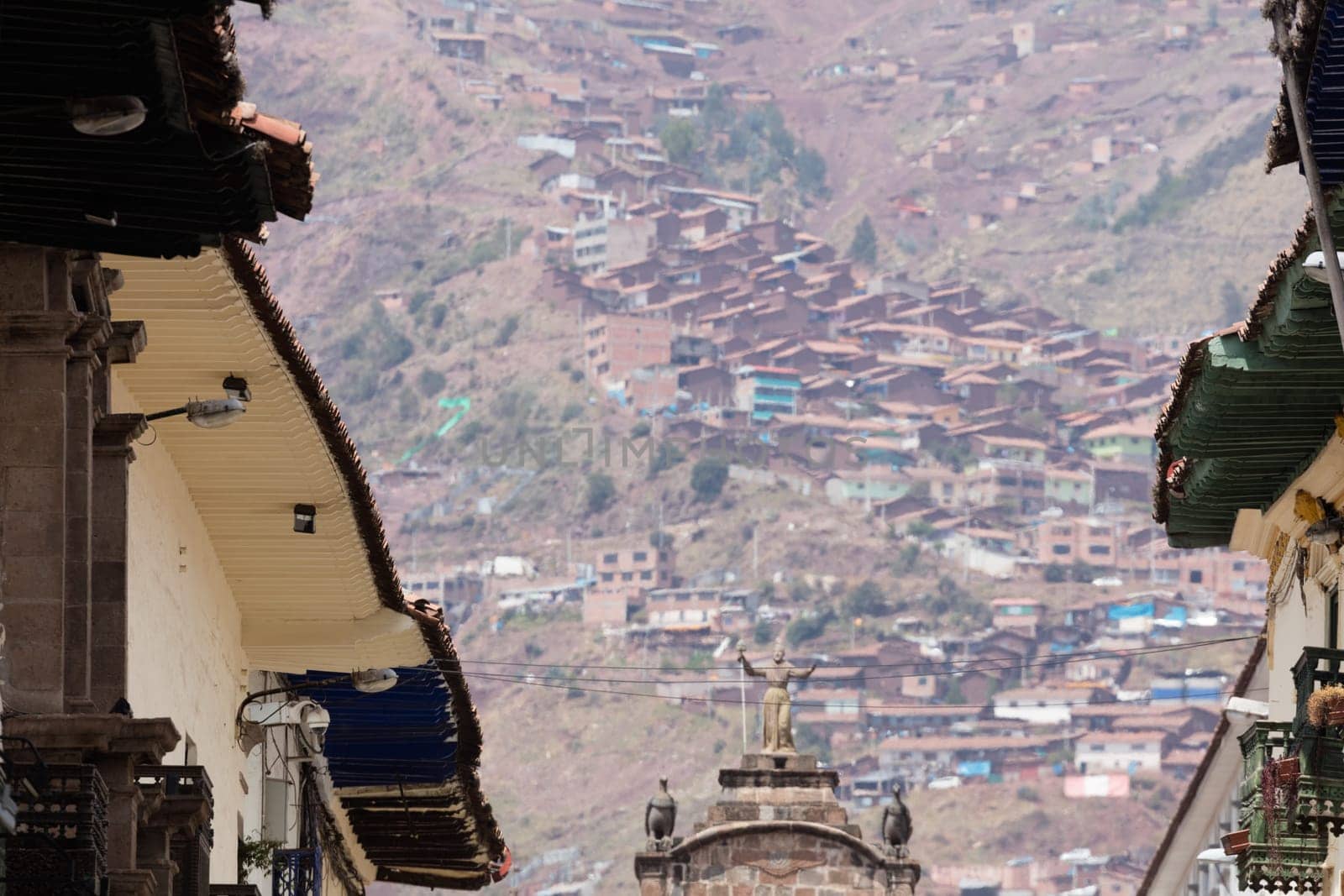 Street scene with a view over the rooftops of Cusco, Peru