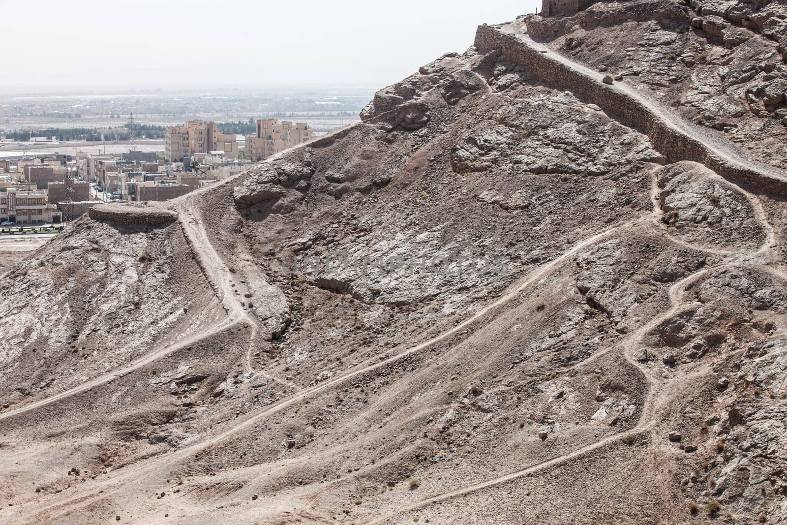 tower of silence , Yazd, Zoroastrian tradition considered a dead body to be nasu, unclean. To preclude the pollution of earth or fire  the bodies of the dead are placed a top a dakhma and so exposed to the sun and to scavenging bird