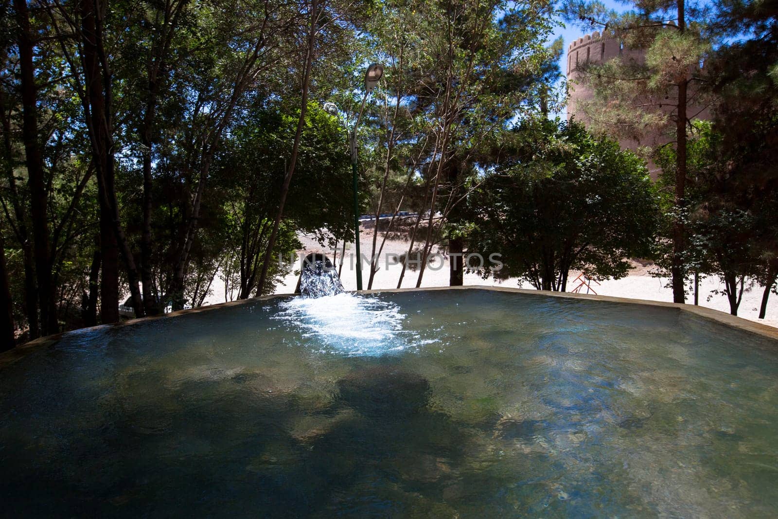 Fountain near Rayen, citadel of the Middle ages in Iran