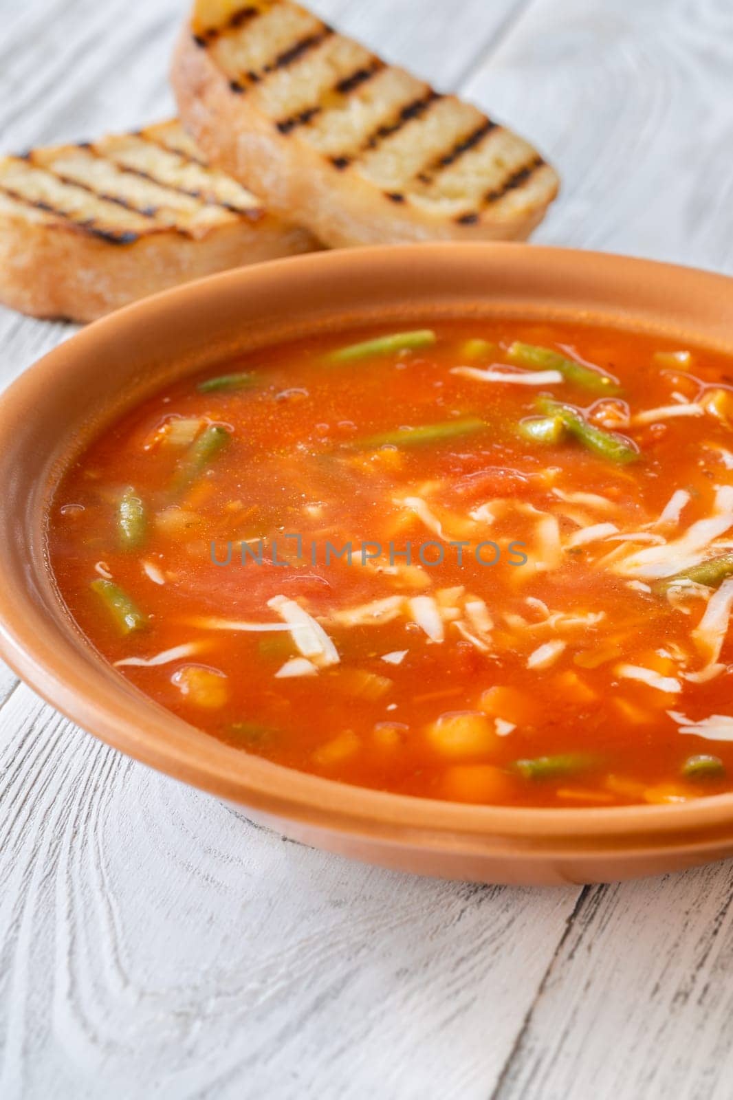 Portion of Minestrone soup made with vegetables and stock