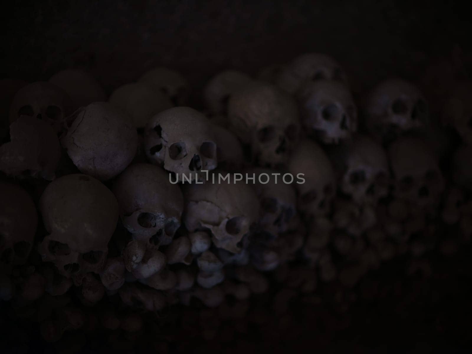 Skull and bones in ancient ossuary, Naples