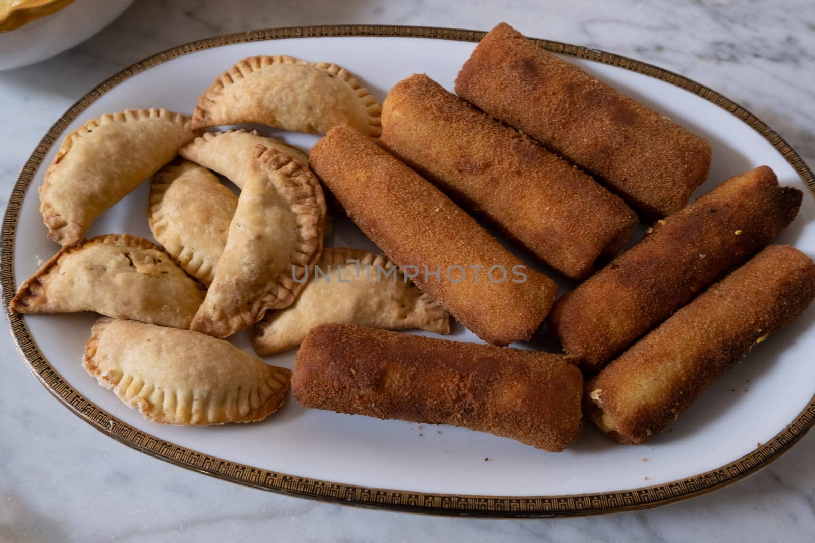 Sri Lankan rolls and samosas homemade  filled with chickemn, curry and tuna