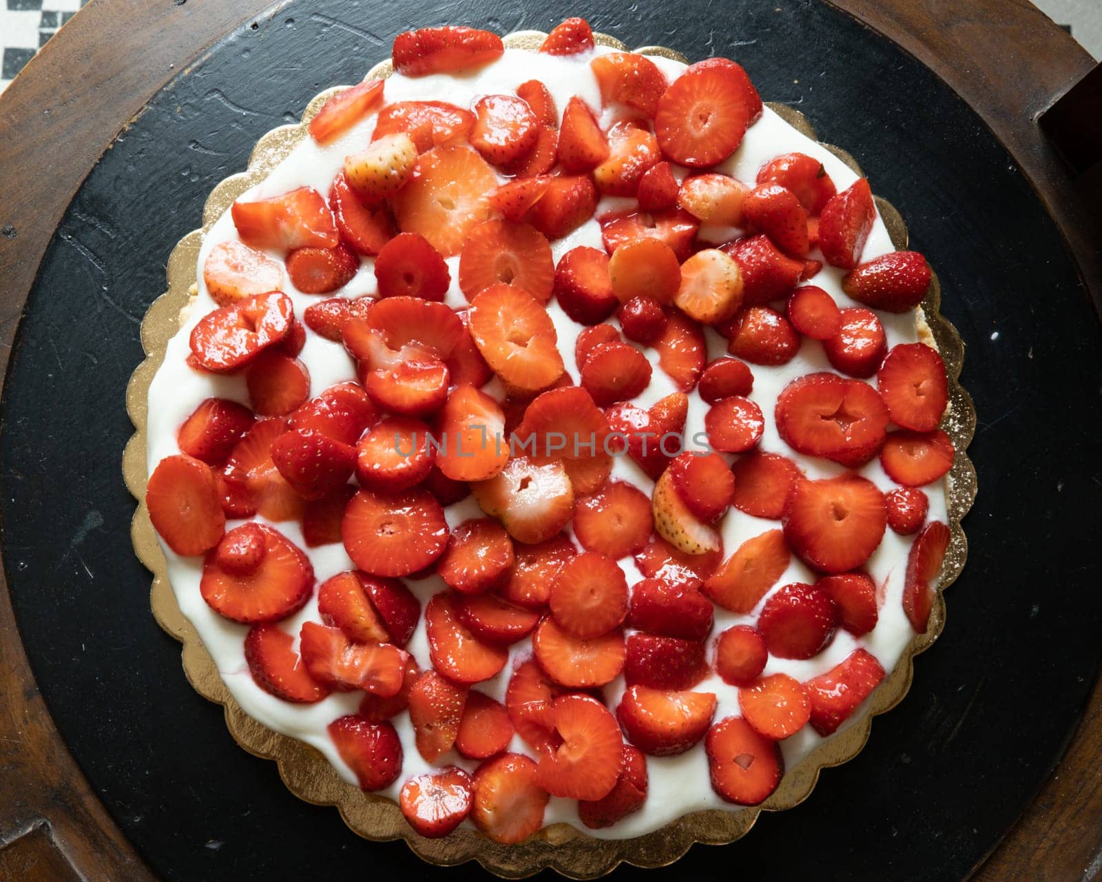strawberry cake on wooden background, selective focus