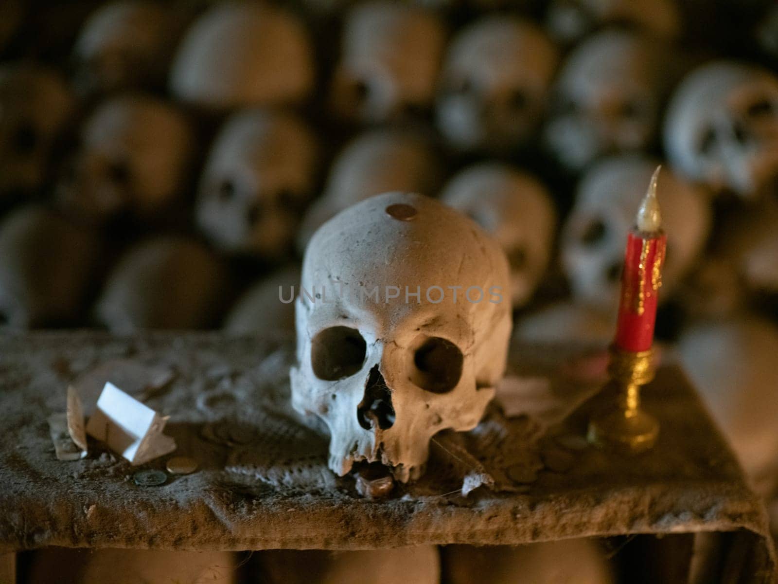 Skull and bones in ancient ossuary, Naples