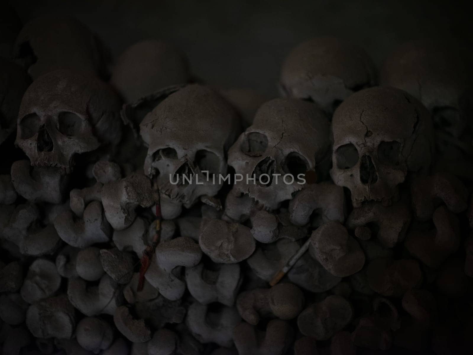 Skull and bones in ancient ossuary, Naples