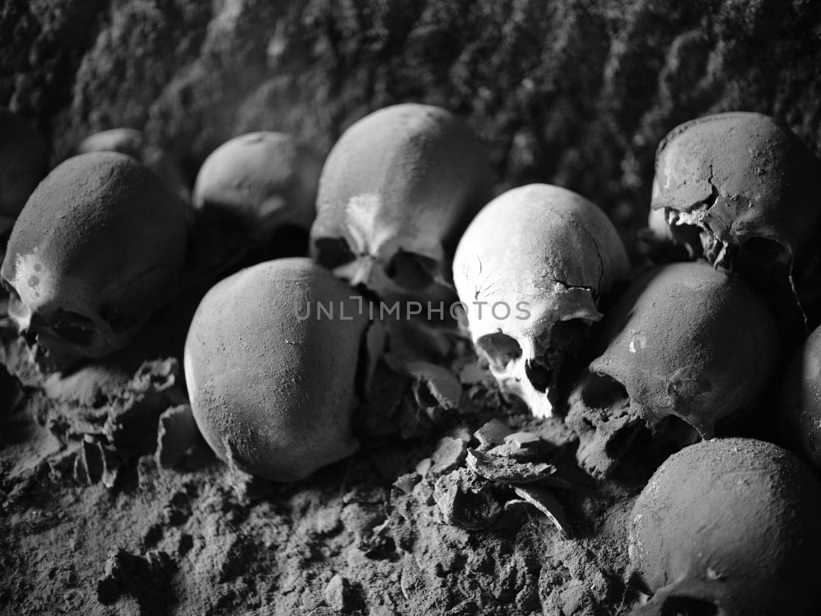 Skull and bones in ancient ossuary, Naples