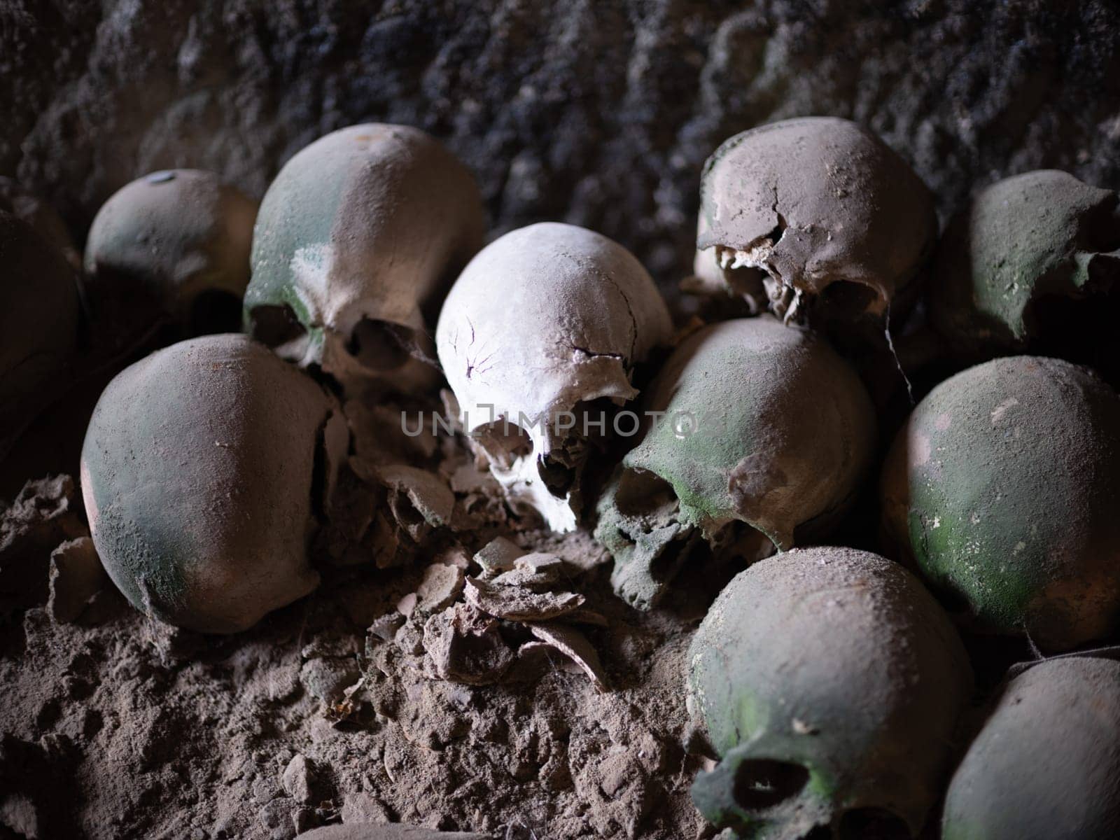 Skull and bones in ancient ossuary, Naples