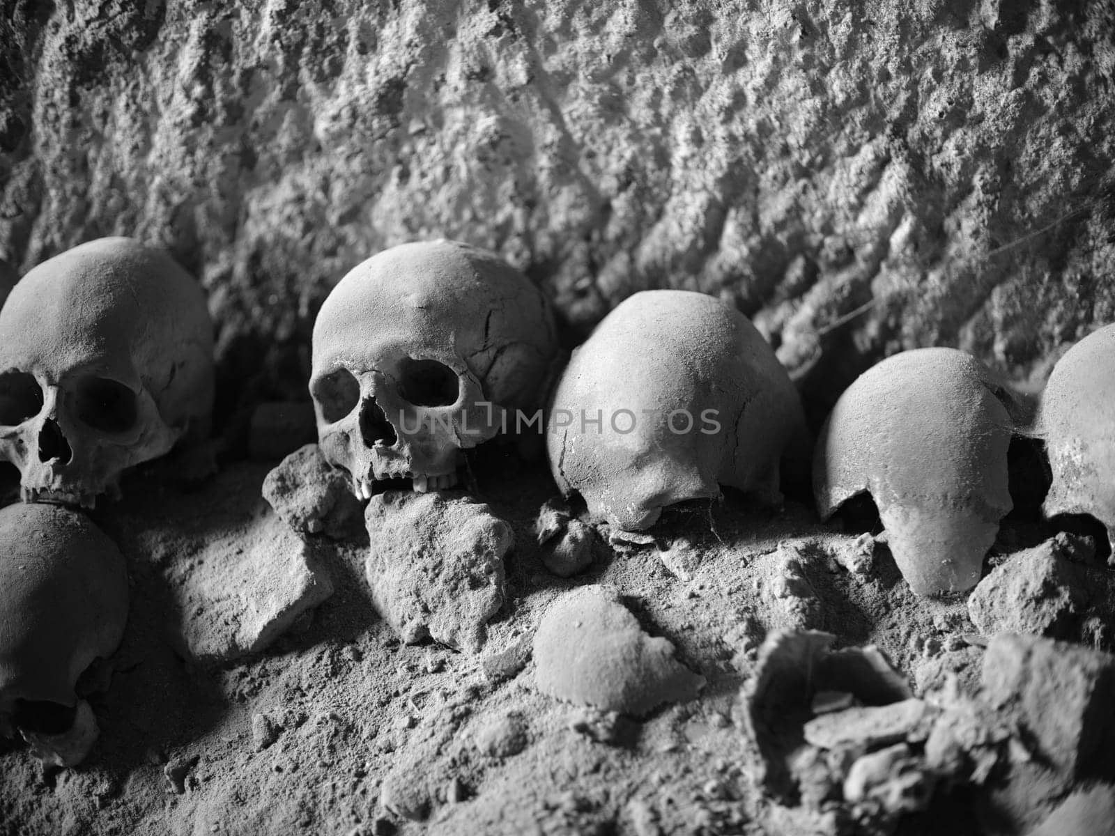Skull and bones in ancient ossuary, Naples