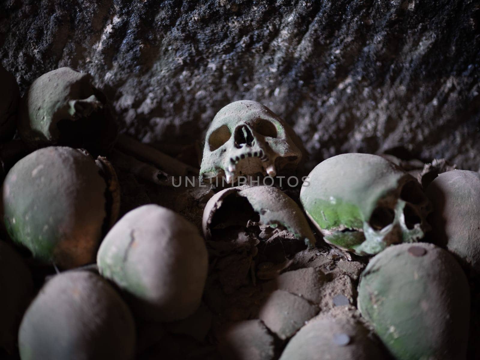 Skull and bones in ancient ossuary, Naples