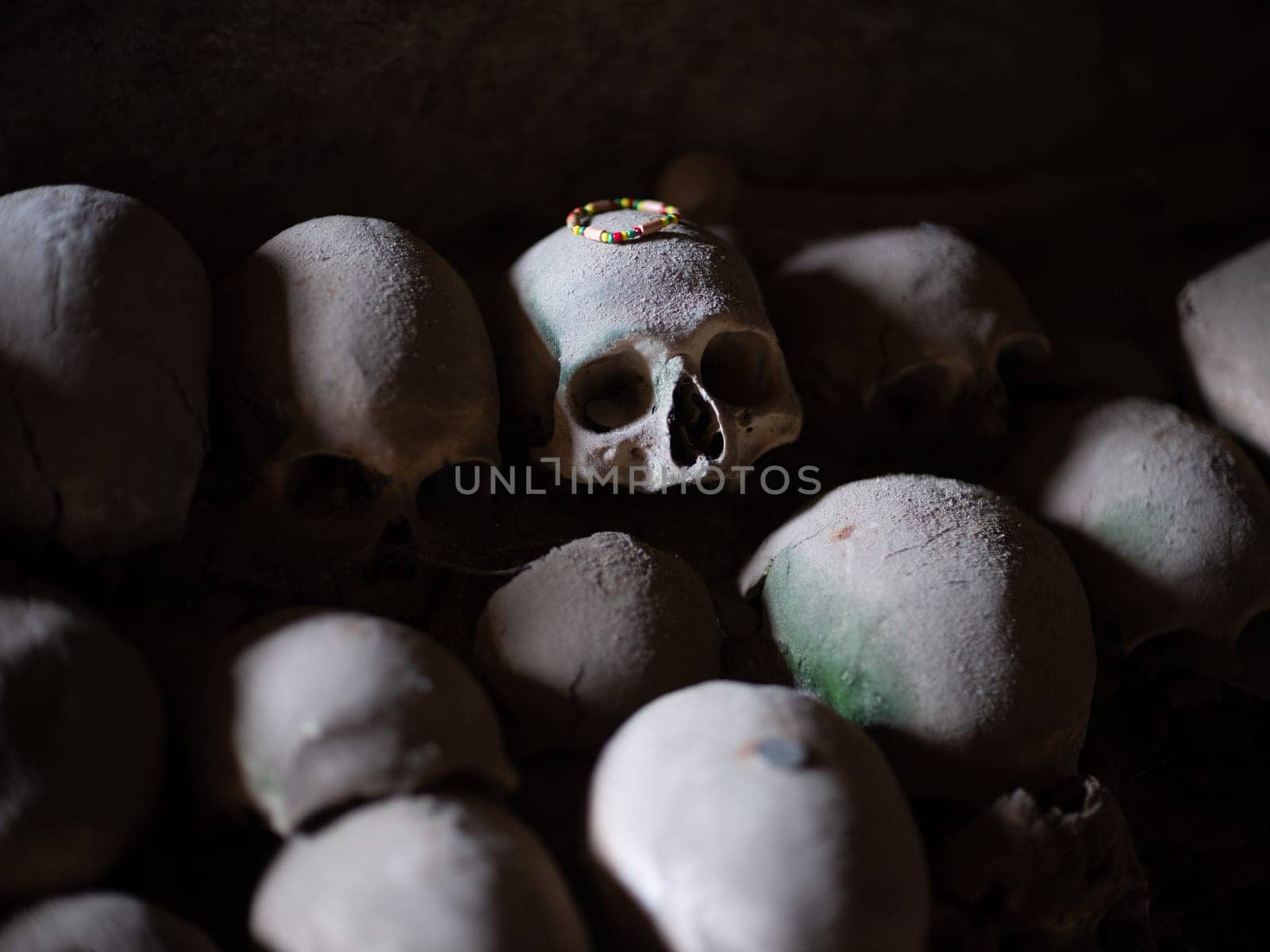 Skull and bones in ancient ossuary, Naples