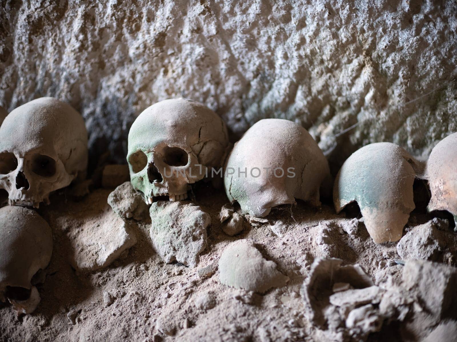 Skull and bones in ancient ossuary, Naples