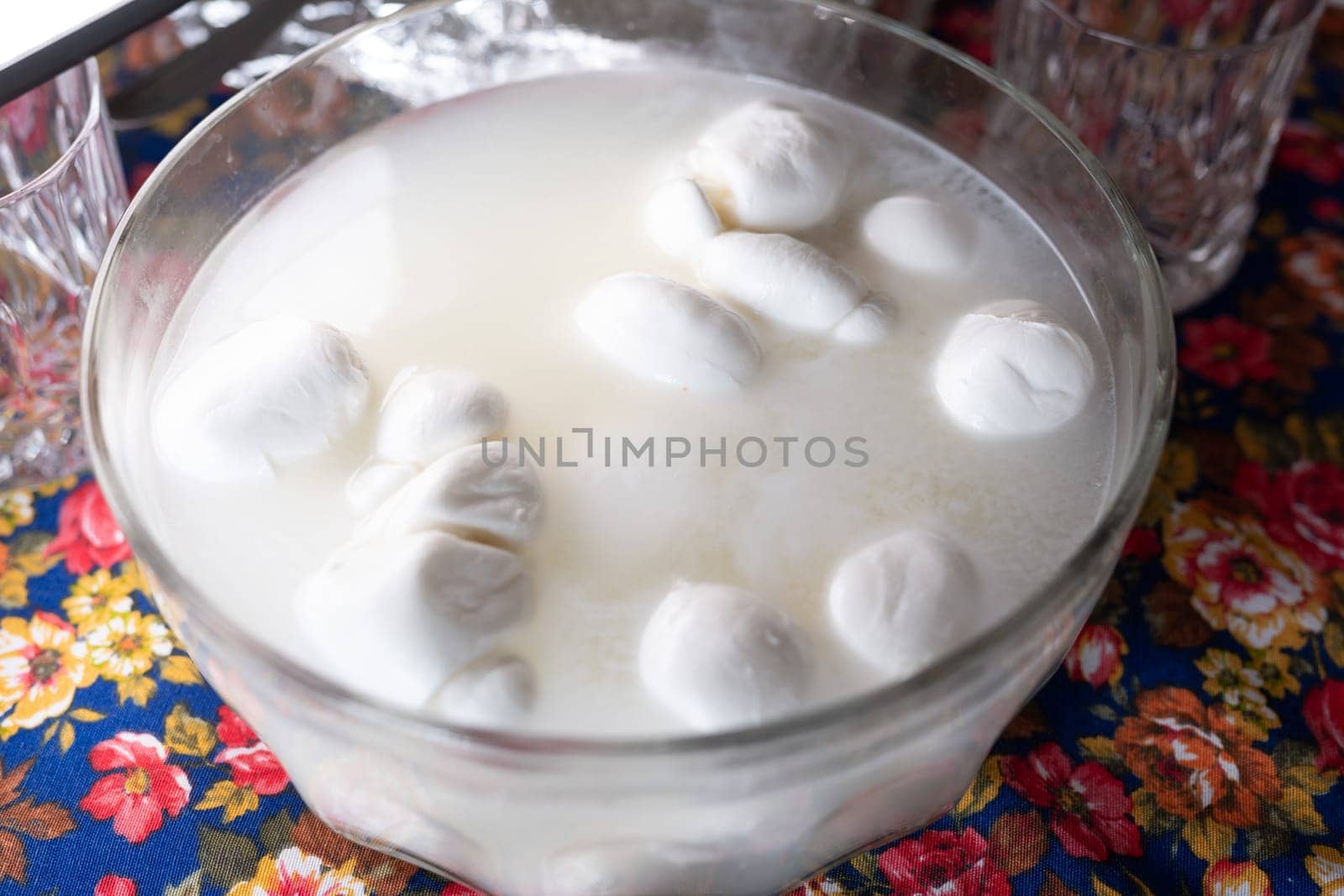 Plate with mozzarella dipped in water