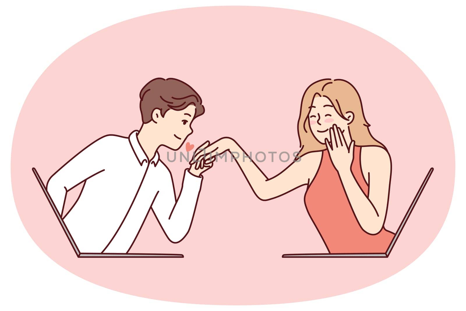 Determined guy kisses hand of embarrassed girl looking out of laptop screen. Metaphor of online dating and flirting in email correspondence or remote rendezvous lovers