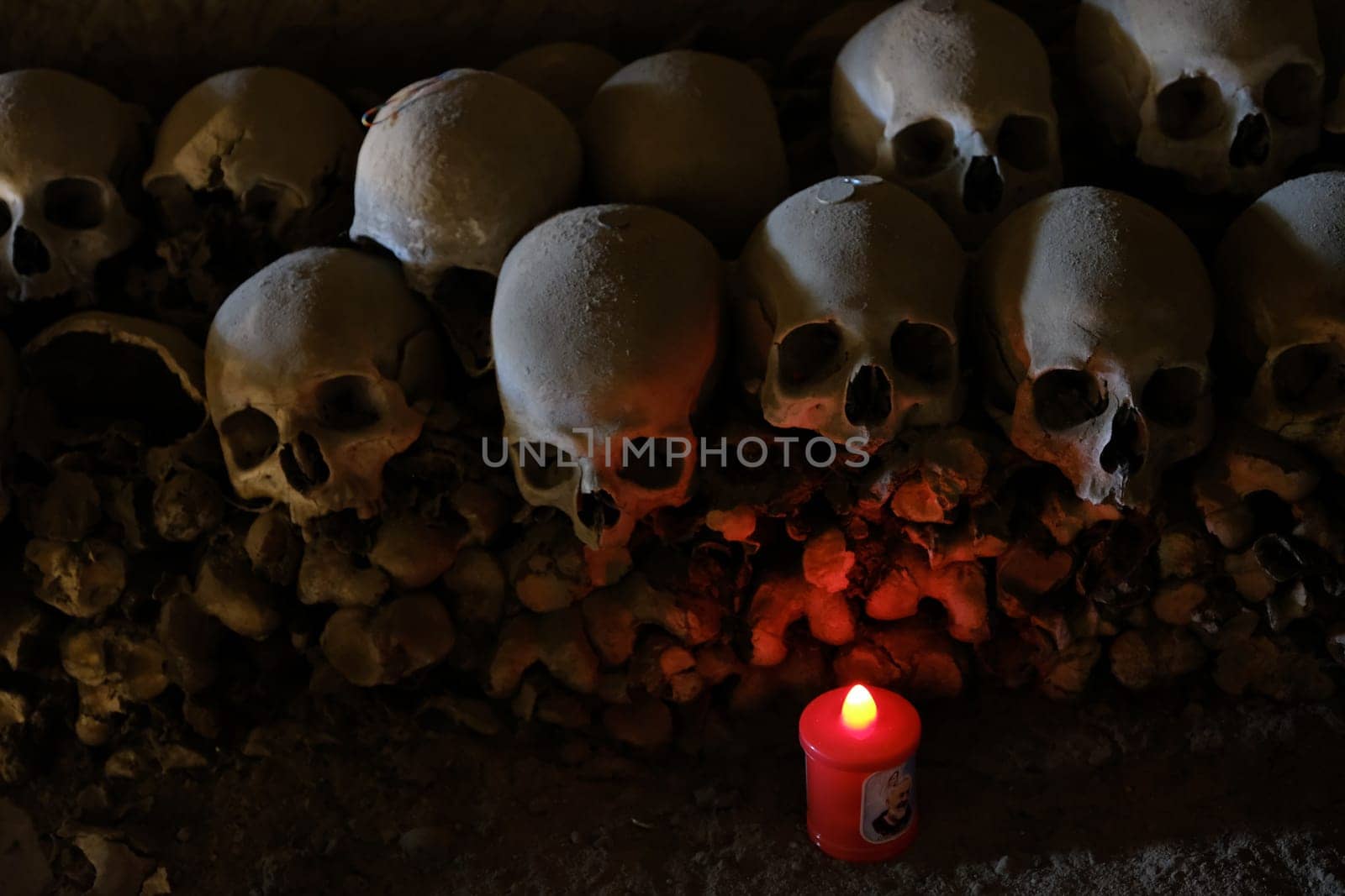 Skull and bones in ancient ossuary, Naples