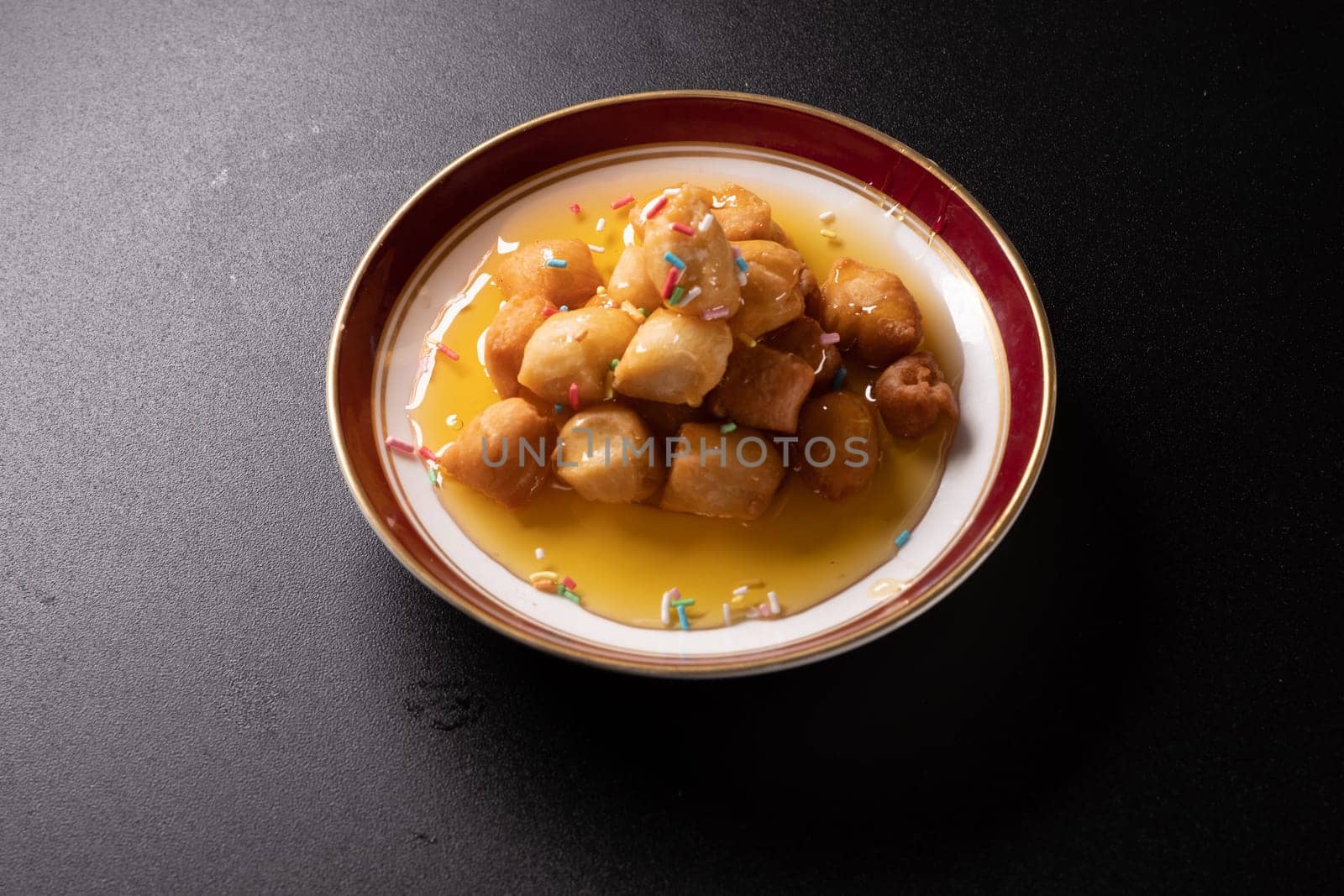 Struffoli - Traditional Neapolitan Dessert Served at Christmas. Honey Glazed, Fried