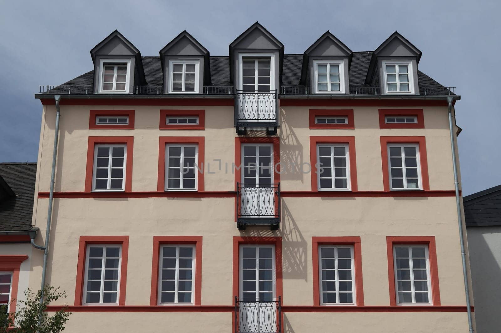 beautiful multistory house, blue sky in the background