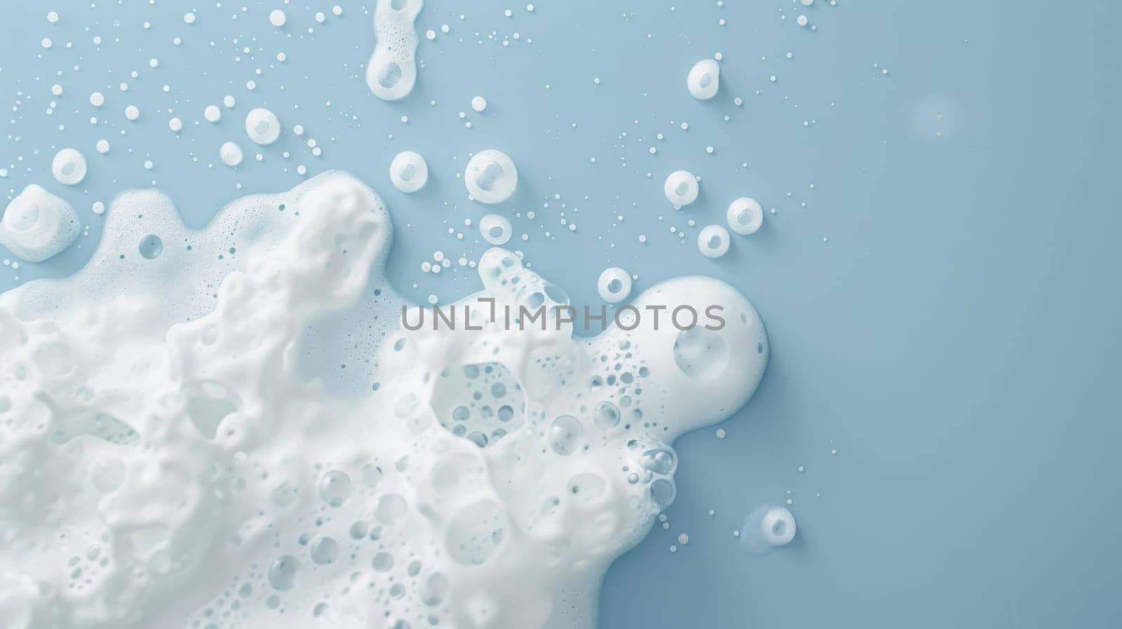 A blue background filled with bubbles and water creates a dynamic and fluid scene. The bubbles float in various sizes and shapes, reflecting the light and adding texture to the smooth water.