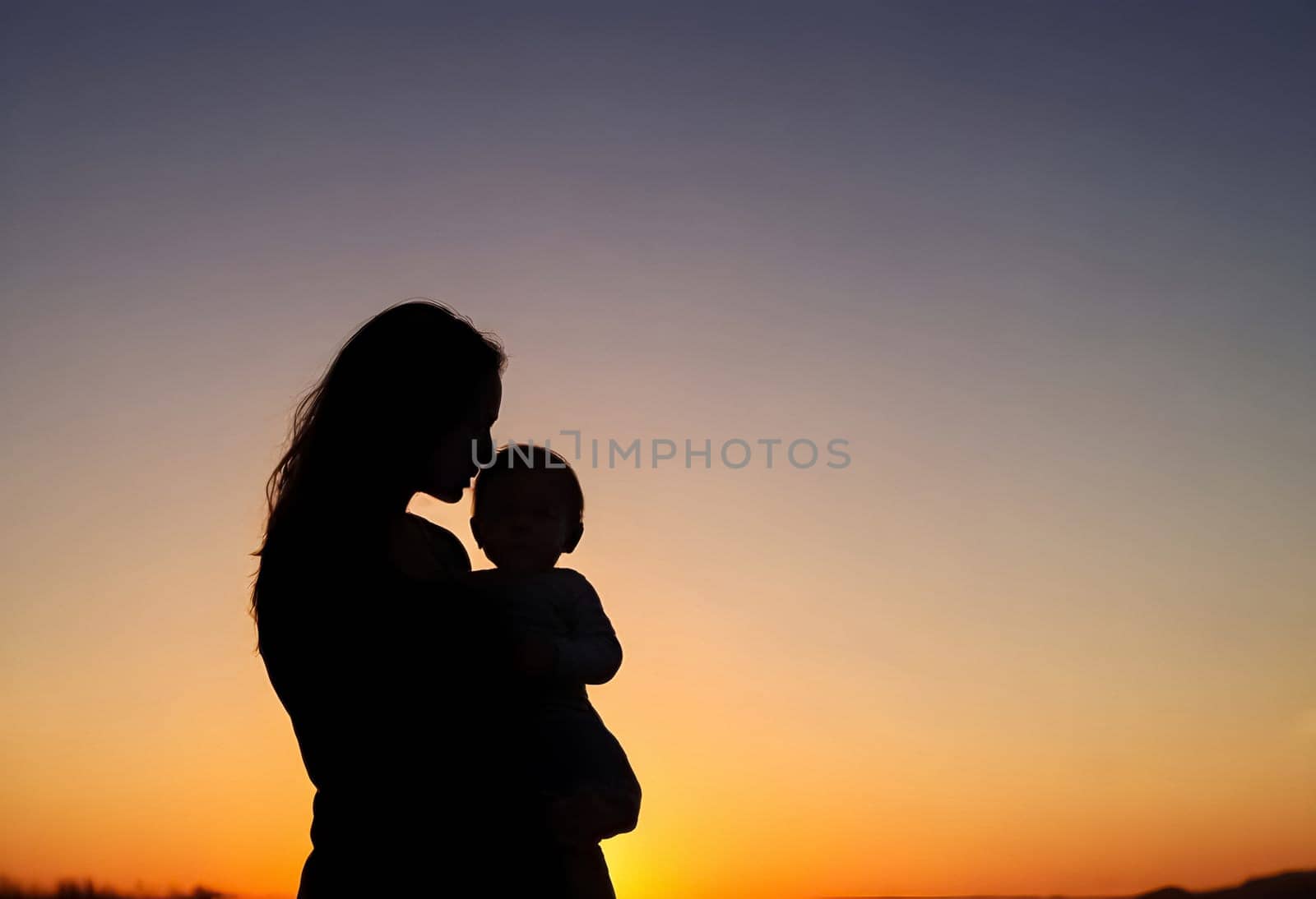 AI generated of silhouette of a mother holding her baby at sunset