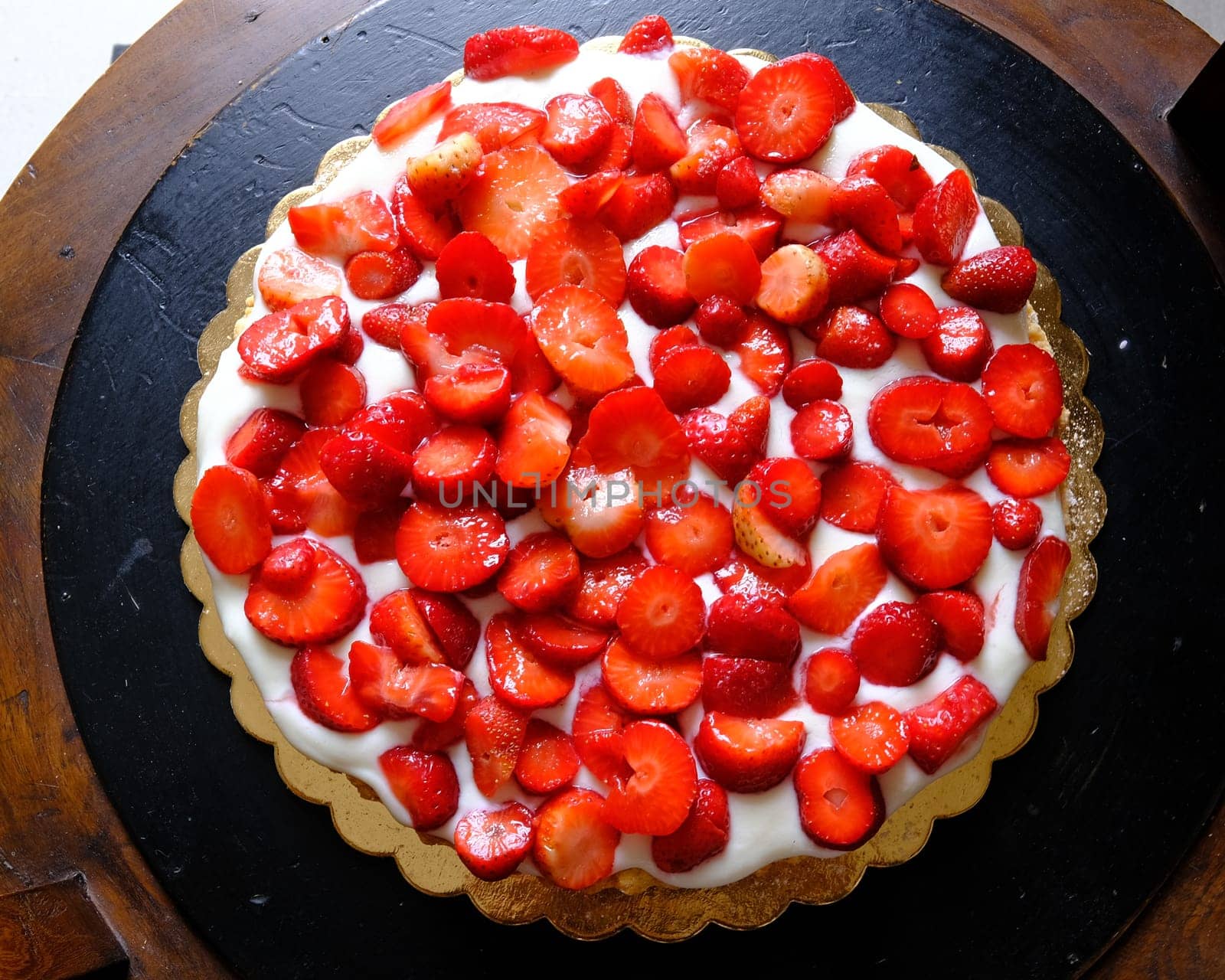 strawberry cake on wooden background, selective focus