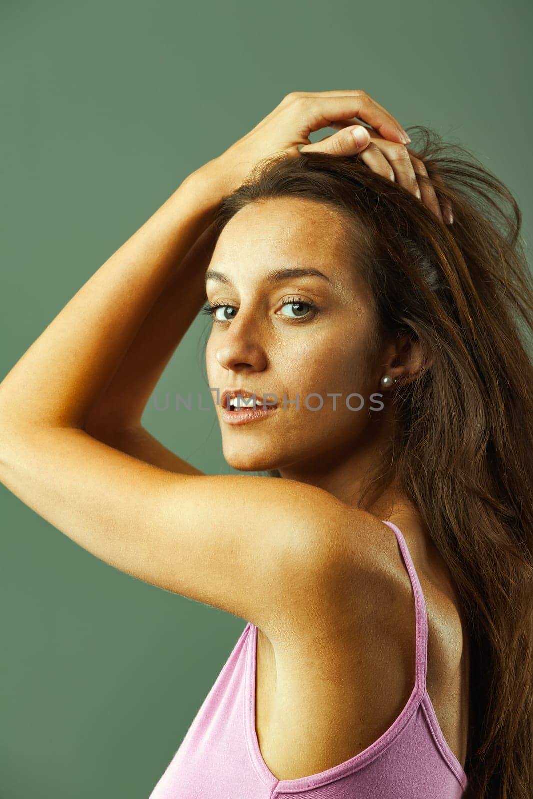 Alluring girl's sexy portrait, poised between profile and three-quarters. Her confidence in attractiveness and desirability shines. Slim, long-haired, blossoming. It's her time
