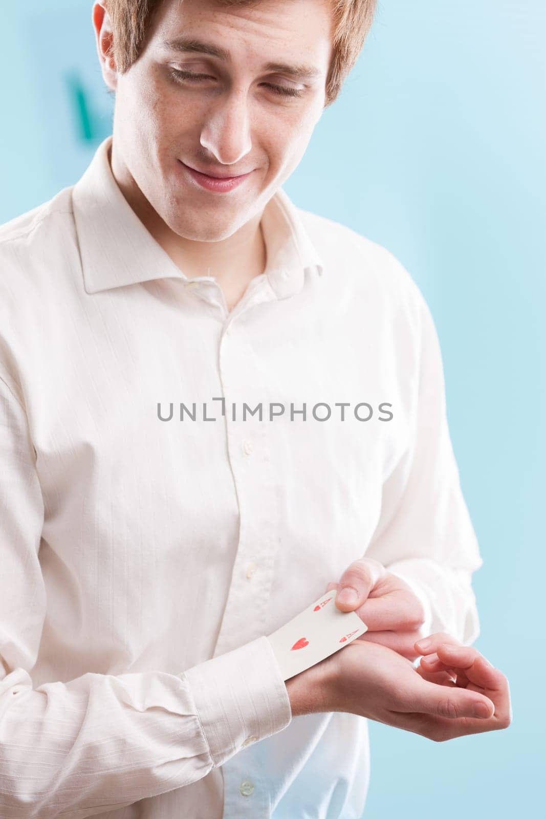 In a blurred blue office, a young redhead man pulls out his secret weapon. It embodies out-of-the-box solutions when best practices aren't enough