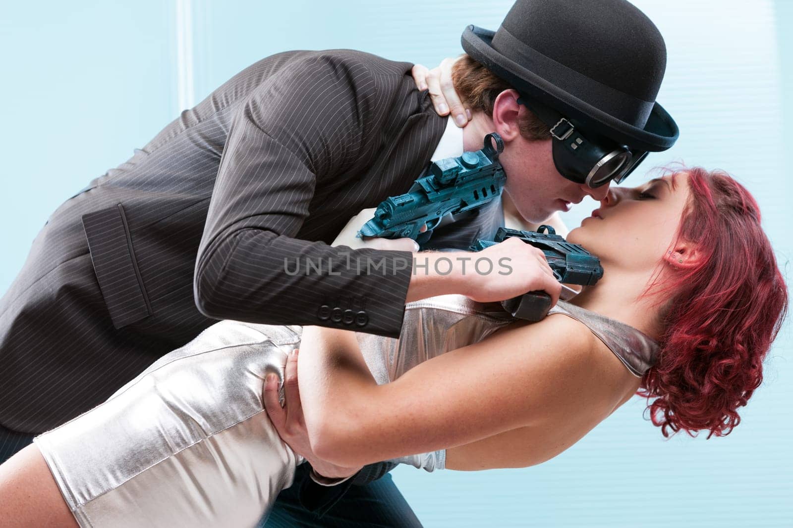 Steampunk spies in love, yet bound by duty. Their conflict simmers in a fervor of passion