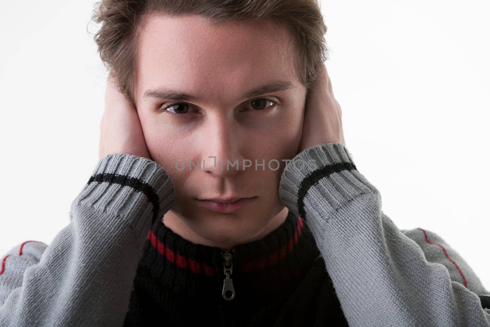 Fake news is overwhelming a man covers his ears, expressing his urge to eliminate the noise. He believes in returning to authentic, human-paced, and accurate sources of information